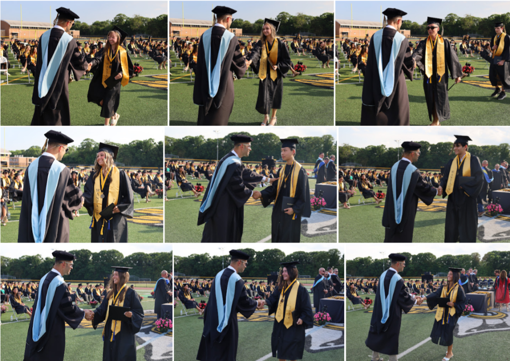 students receiving diplomas and shaking mans hand